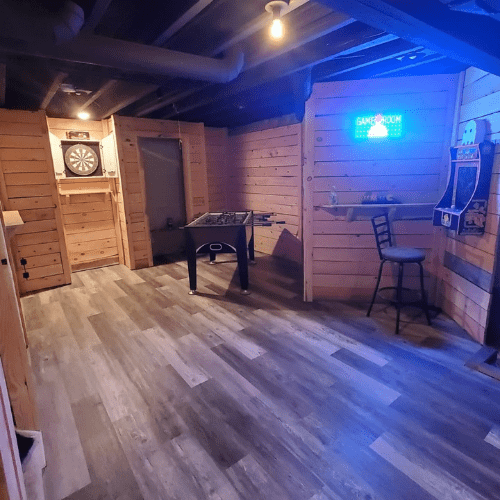 Completed basement bar and entertainment room built by Homes by Covenant in Central New York