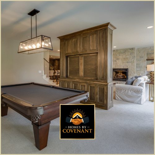 Finished basement game room with pool table and custom lighting.