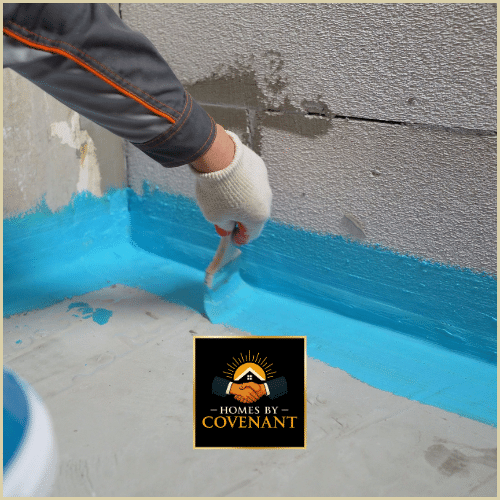 Basement waterproofing with applied sealant to protect foundation walls from moisture.