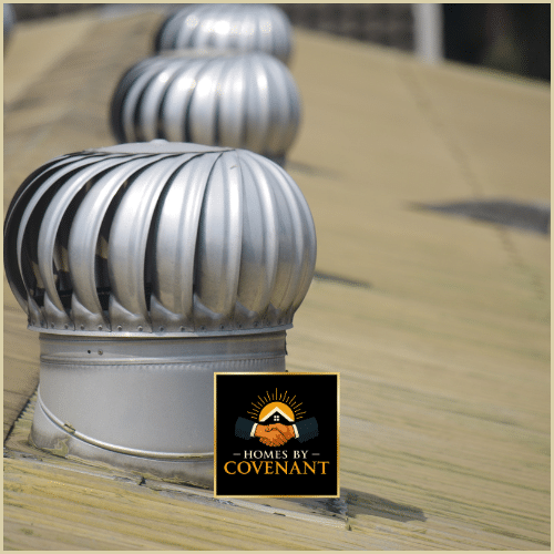 Roof ventilation turbines installed on a residential roof to improve airflow and prevent moisture buildup.