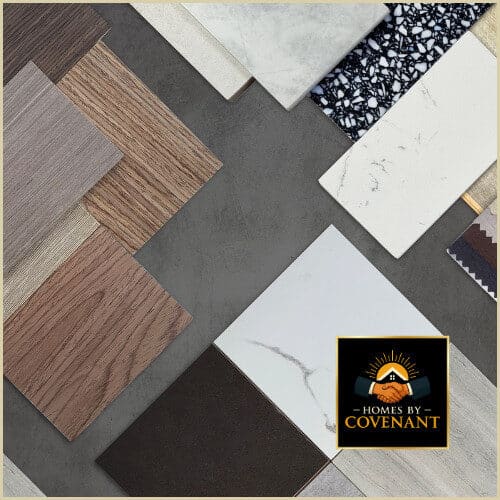 Assorted flooring samples including hardwood, tile, and luxury vinyl plank arranged for modular home design selection.