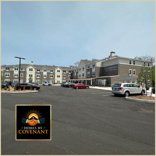 Row of modular townhomes with unified architecture and multi-unit layout.