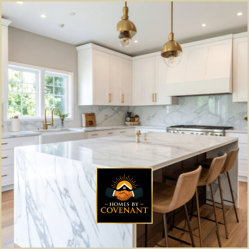 Elegant marble kitchen with center island and pendant lighting.