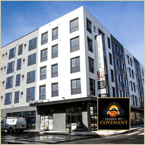Mid-rise modular apartment building engineered with multi-story structural systems.