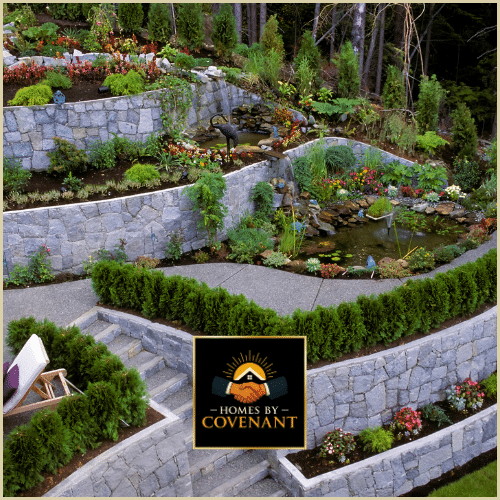 Stone block retaining walls built to support elevated landscaping.