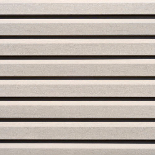 Beige horizontal vinyl siding with a smooth exterior profile.